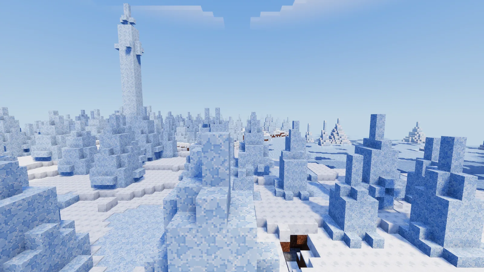 Tall spires of ice rising from a snowy plain