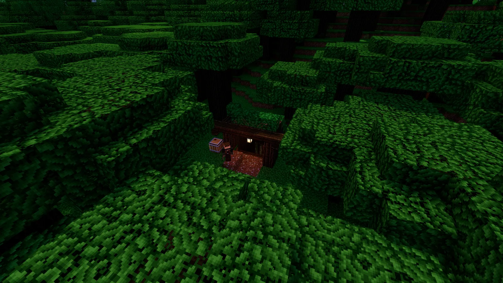 The timber mouth of a hideout dug into a hill