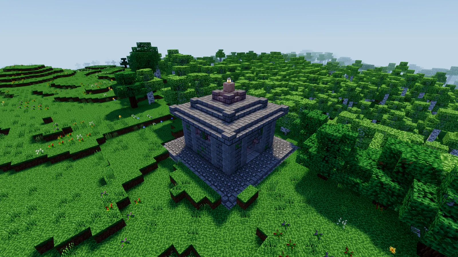 A stone mausoleum on a hill